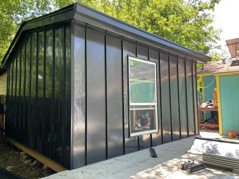 Black standing seam metal wall panels for Metal Roof Installation in Clarkston